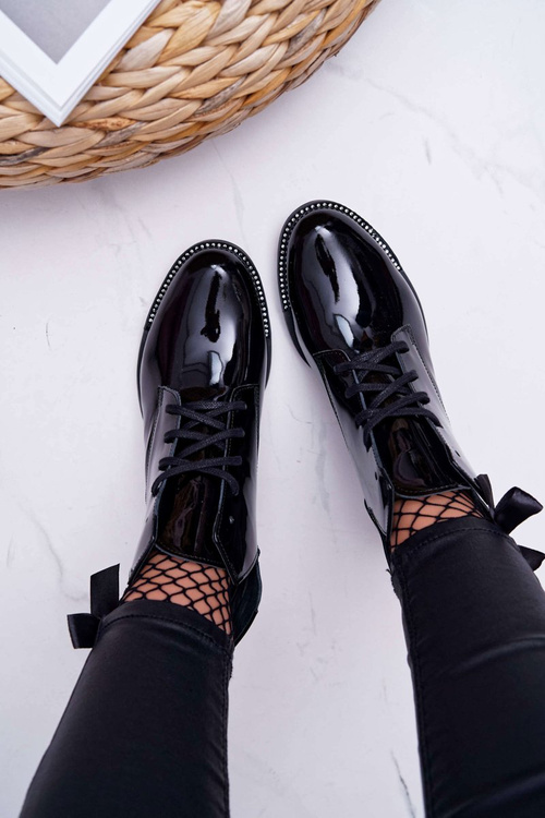 Жіночі чоботи на плоскому каблуці лаковані чорні Nicole 2420