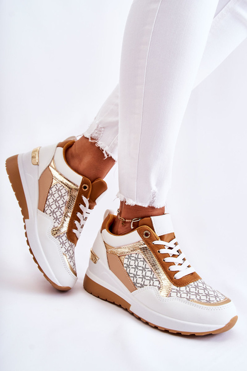 Жіночі шкіряні спортивні туфлі на танкетці білі Catrine