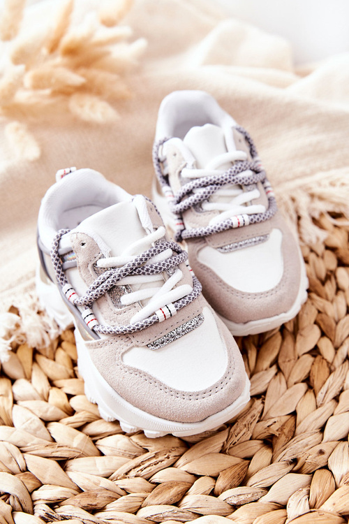 Дитяче спортивне взуття Кросівки білі Rommie