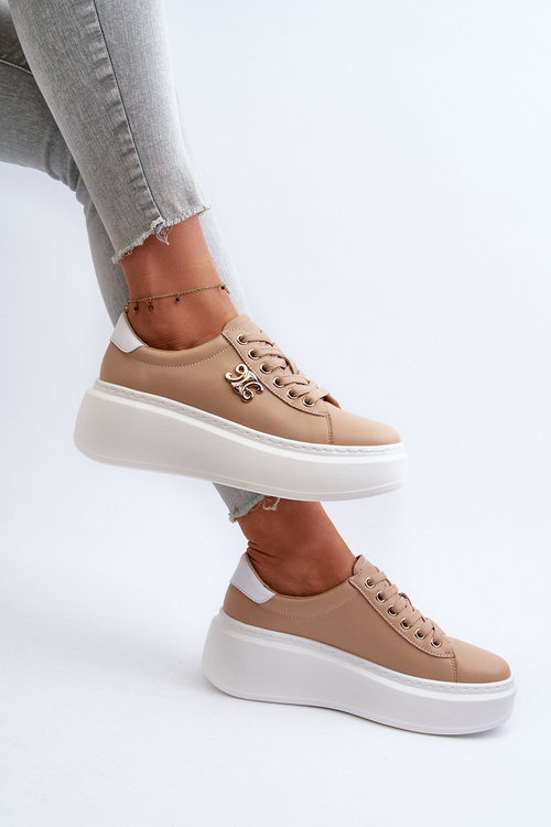 Коричневі жіночі шкіряні кросівки на платформі Pernalia