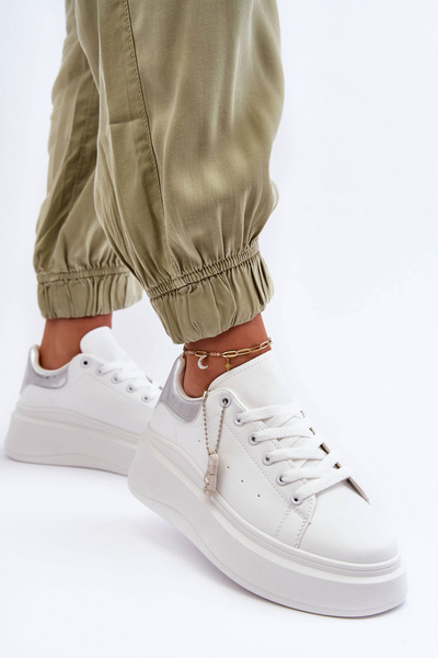 Жіноче спортивне взуття на масивній платформі біло-сріблястий Mariell