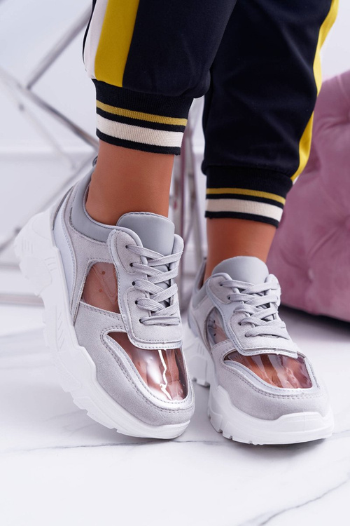 Спортивні жіночі кросівки на прозорій сірій товстій підошві
