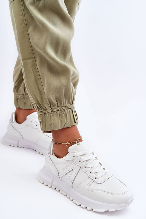 Жіноче шкіряне спортивне взуття білого кольору Kabama