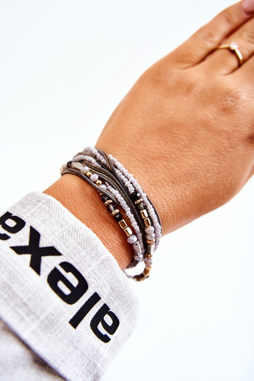 Жіночий браслет з перлами і кристалами сірий