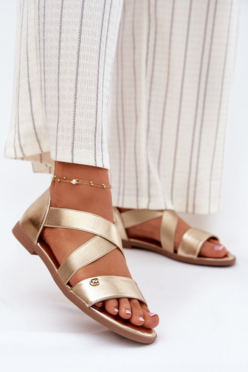 Жіночі плоскі сандалі з еластичними ремінцями золоті Marinea