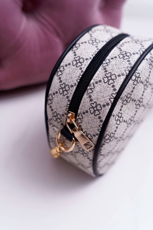 Сумочка комод кругла бежево-чорна