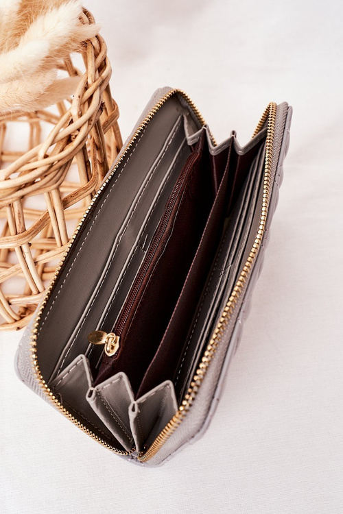 Великий стьобаний жіночий гаманець сірого кольору