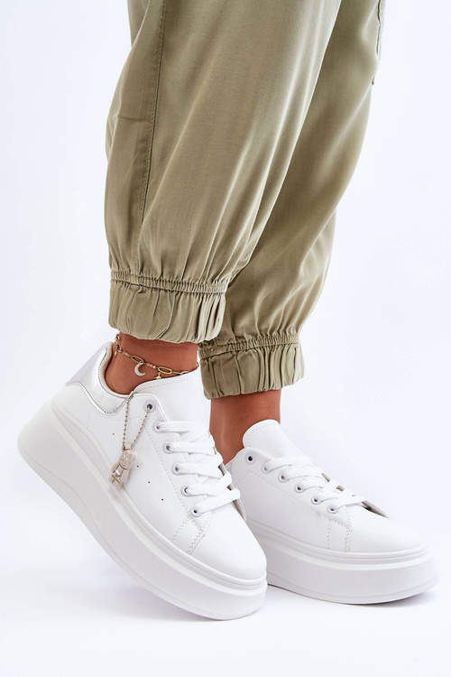 Жіноче спортивне взуття на масивній платформі біло-сріблястий Mariell