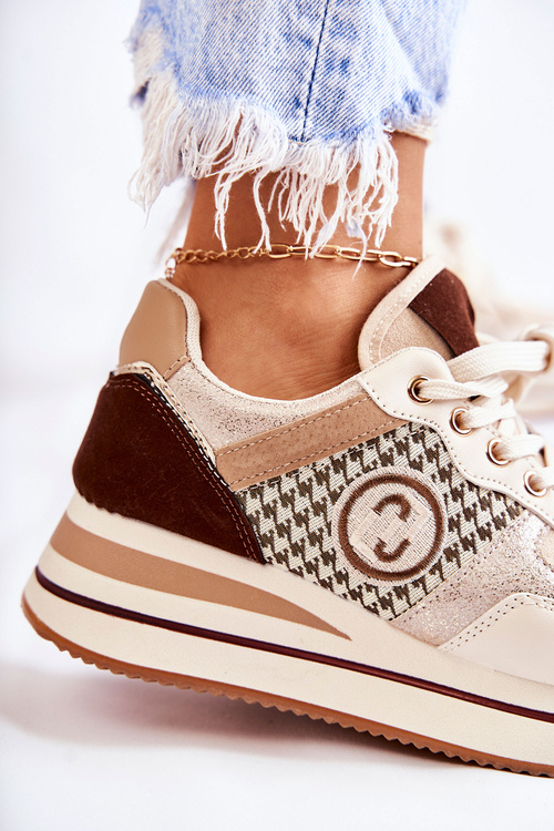 Модні жіночі спортивні туфлі на танкетці Бежево-коричневі Aronne