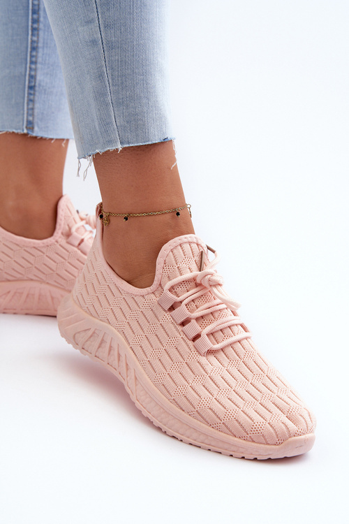 Жіноче спортивне взуття з легкої тканини рожевого кольору