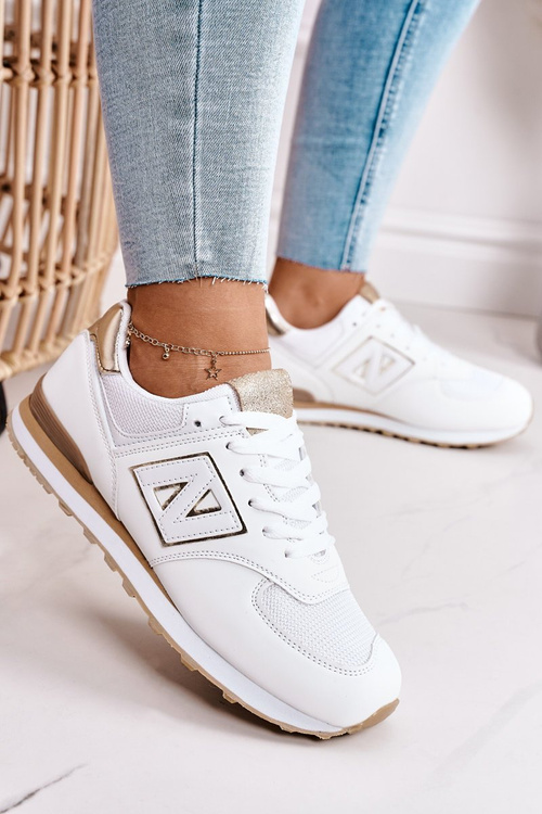 Жіноче спортивне взуття Кросівки біло-золоті Last Minute