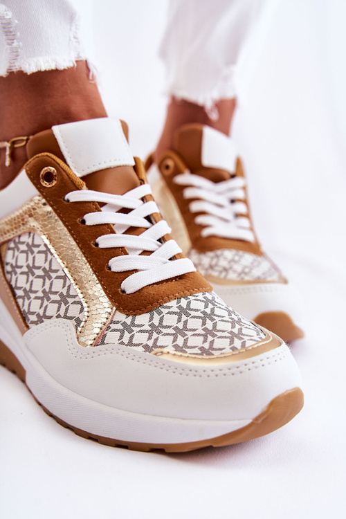 Жіночі шкіряні спортивні туфлі на танкетці білі Catrine