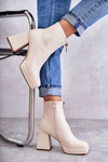 Жіночі чоботи на масивному каблуці на блискавці бежеві Carrera
