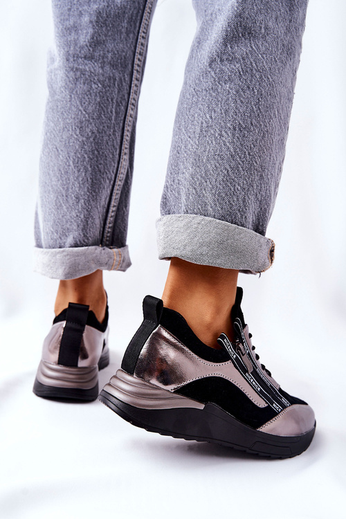 Шкіряне спортивне взуття Кросівки чорного та сріблястого кольору