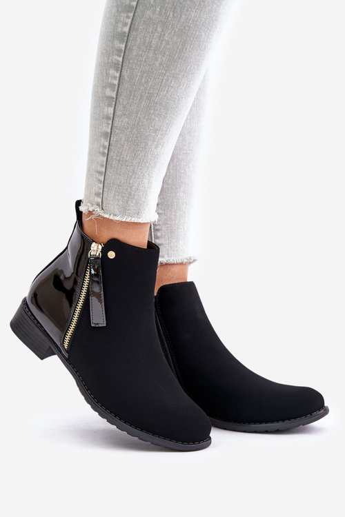 Утеплені ботильйони на плоскому каблуці та низькій халяві чорного кольору Zinariella