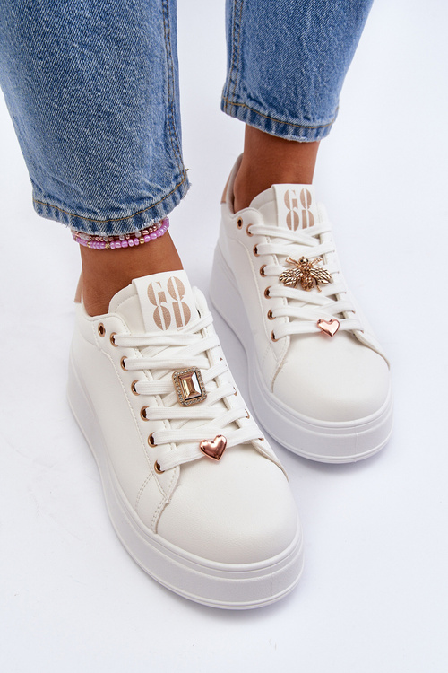 Жіночі кросівки на платформі з білими прикрасами Herbisa