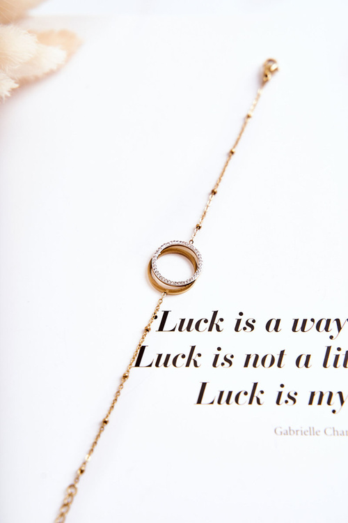 Елегантний жіночий браслет з орнаментом і фіанітами