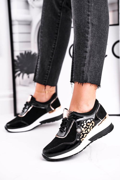 Жіноче спортивне взуття Кросівки шкіряні чорні 21-7778