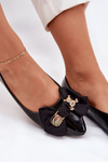 Лакові балерини з бантом та золотою брошкою чорні Rivona