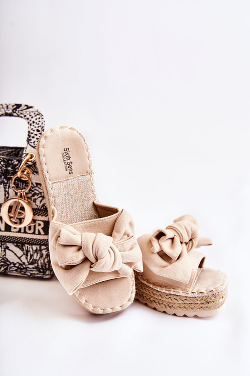 Жіночі тапочки на танкетці з бантом бежеві Tayla