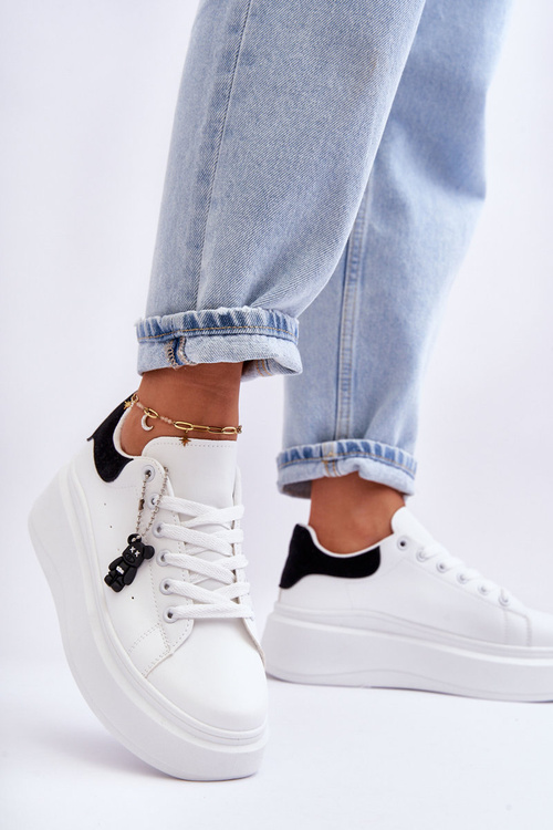 Жіноче спортивне взуття на масивній платформі біло-чорне Mariell