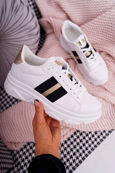 Спортивні жіночі туфлі на товстій підошві білого кольору