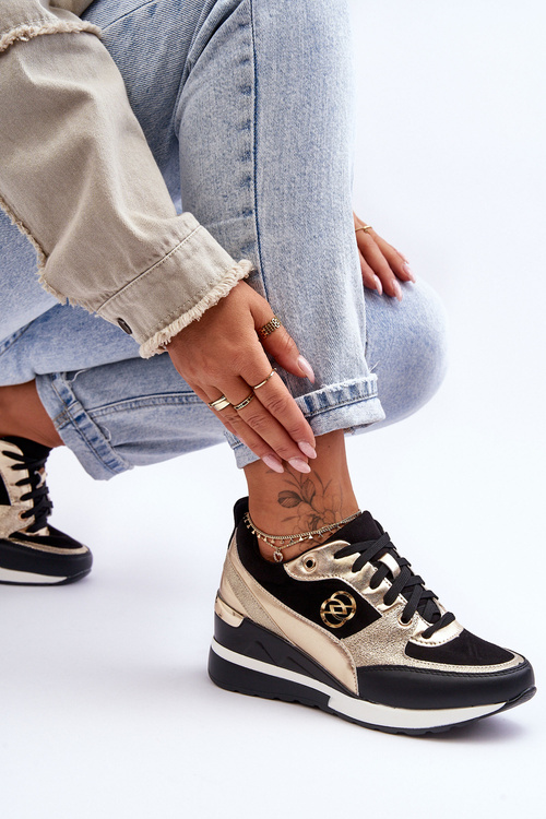 Жіночі кросівки на танкетці чорно-золоті Genova