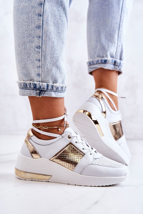 Жіночі шкіряні спортивні туфлі на танкетці білого кольору Larson