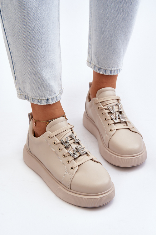 Жіночі шкіряні кросівки з бежевими прикрасами Dysuria