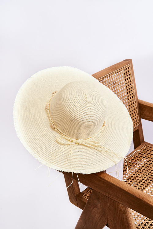 Жіноча модна шапка з декоративним бантом світло-бежева