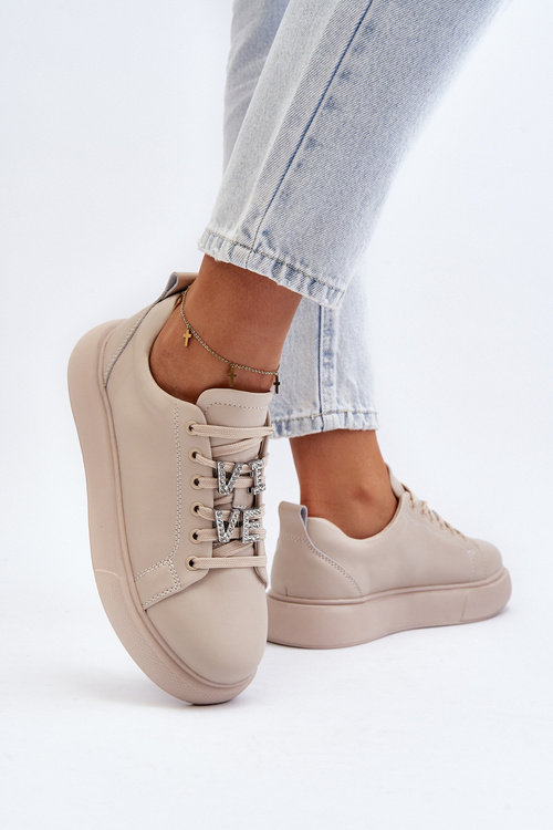 Жіночі шкіряні кросівки з бежевими прикрасами Dysuria