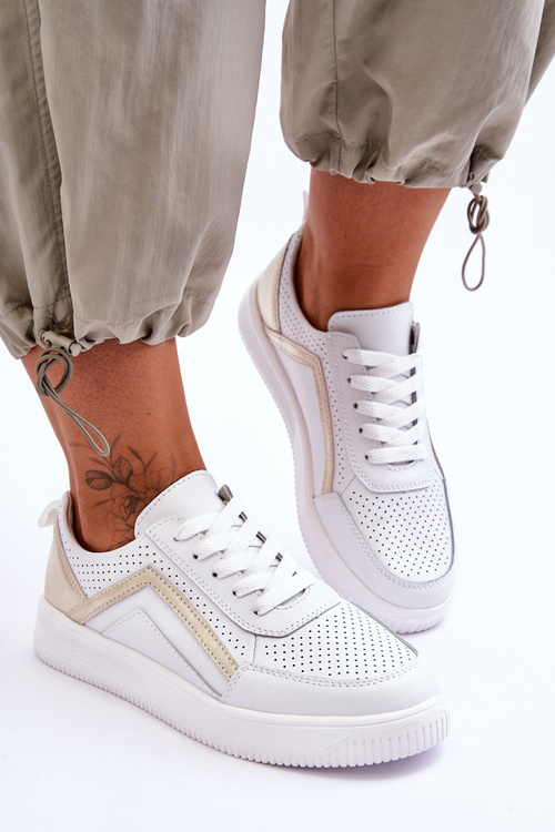 Жіноче шкіряне перфороване спортивне взуття біло-золотого кольору Carvalo