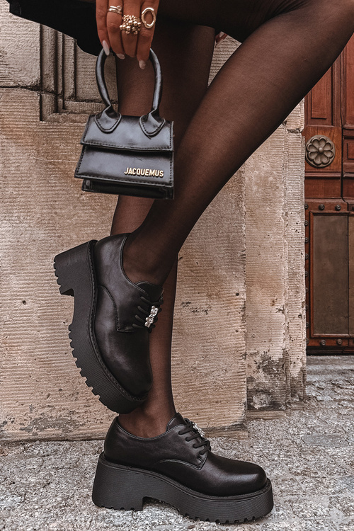 Жіночі мокасини з пряжкою з еко-шкіри чорні Laurea