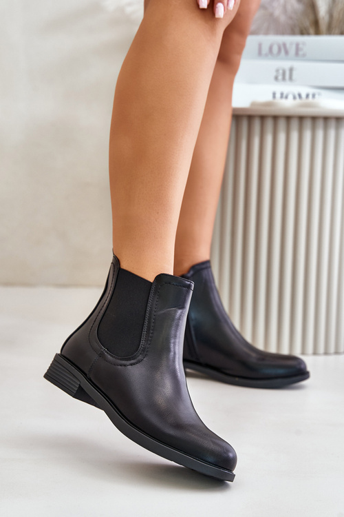 Утеплені черевики челсі на плоскій підошві на блискавці чорного кольору Tinra