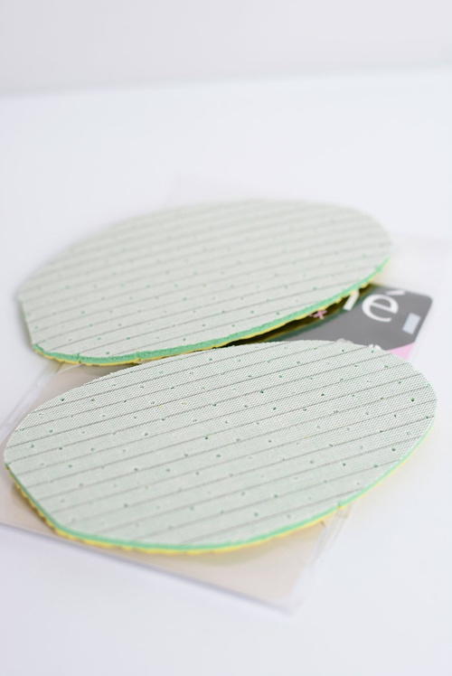 Латексні перфоровані напівустілки Coccine