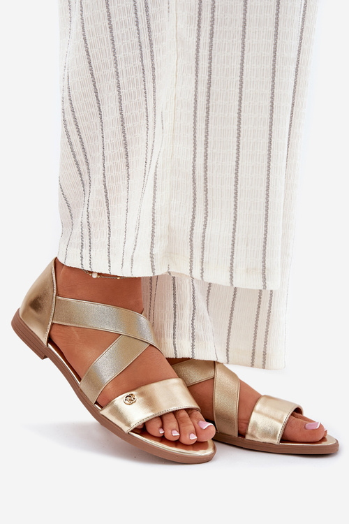 Жіночі плоскі сандалі з еластичними ремінцями золоті Marinea