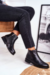Чоботи жіночі на плоскому каблуці шкіряні чорного кольору Fernir