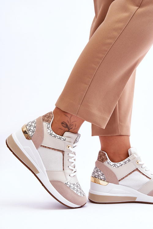 Жіночі шкіряні спортивні туфлі на танкетці білі Catrine