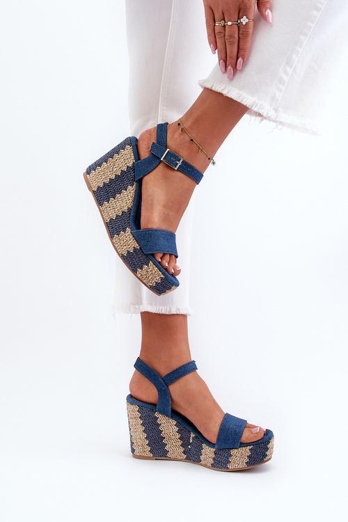 Жіночі джинсові босоніжки на танкетці з косою синього кольору Reviala
