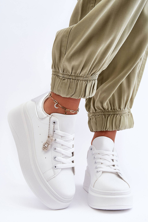 Жіноче спортивне взуття на масивній платформі біло-сріблястий Mariell