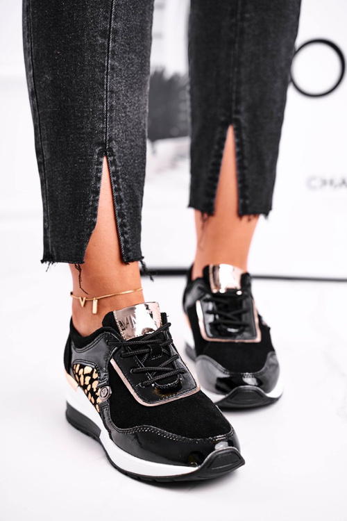 Жіноче спортивне взуття Кросівки шкіряні чорні 21-7778