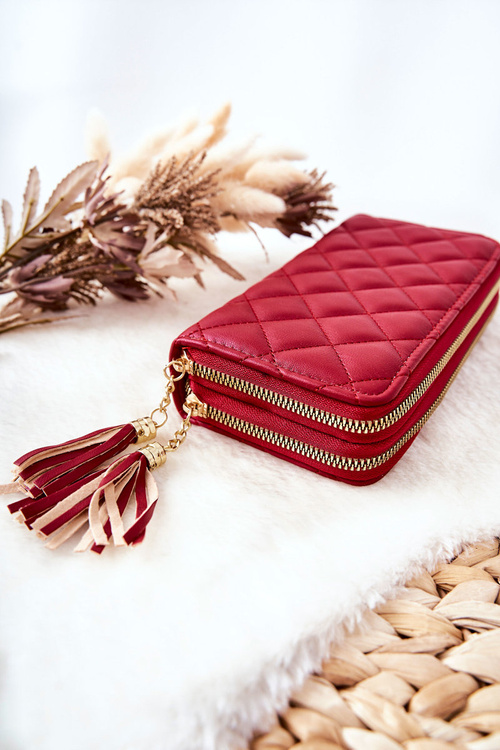 Великий стьобаний гаманець із застібками червоного кольору