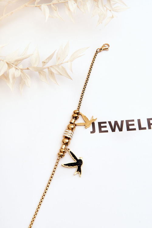 Елегантний жіночий браслет "Клювер" з ластівками з цирконієвого золота