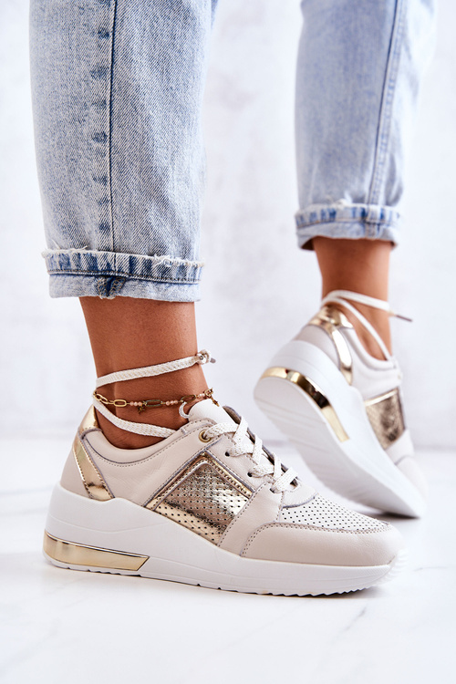 Жіночі шкіряні спортивні туфлі на танкетці бежево-білі Larson