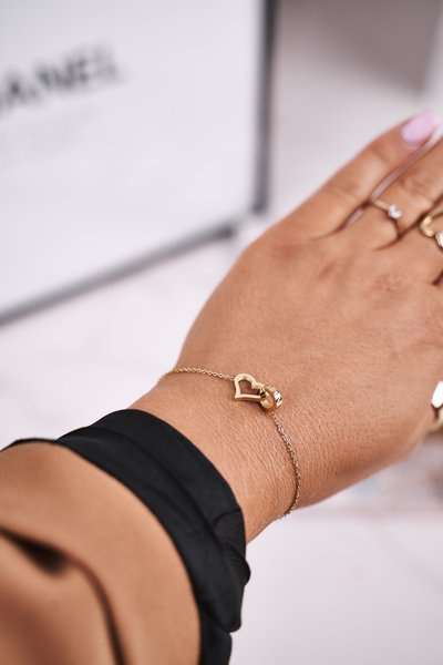 Жіночий браслет "Коло" і "Золоте серце".