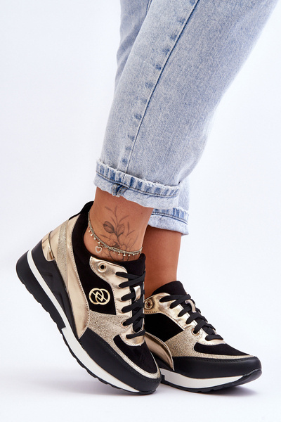 Жіночі кросівки на танкетці чорно-золоті Genova