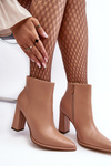 Жіночі шкіряні чоботи на каблуці бежеві Saitana
