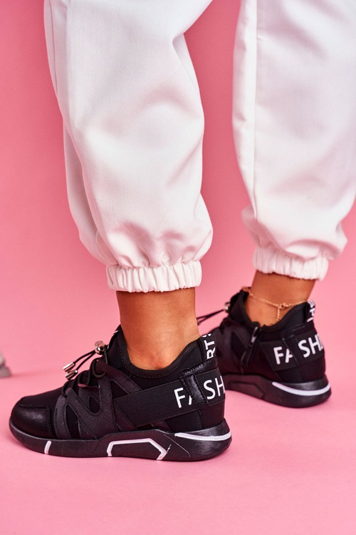 Спортивне жіноче взуття на блискавці та підтягуванні чорного кольору