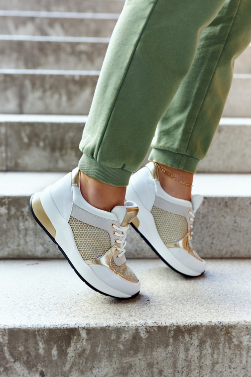 Модне спортивне взуття Жіночі кросівки біло-золоті Danielle