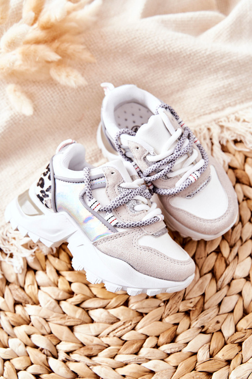 Дитяче спортивне взуття Кросівки білі Rommie